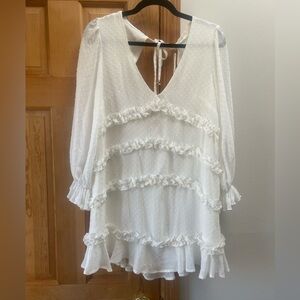 White dress from revolve. Never wore. Tags on!